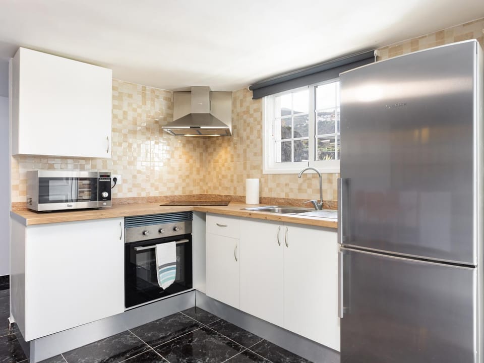 Kitchen or kitchenette, oven, stove