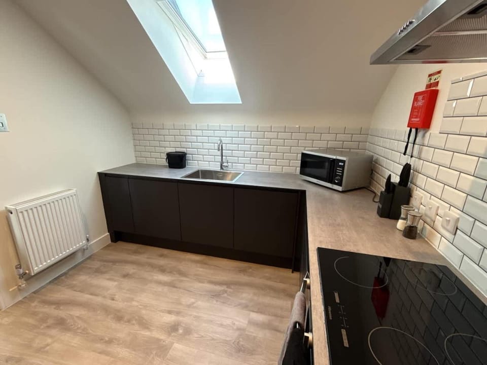 Kitchen or kitchenette, oven, stove