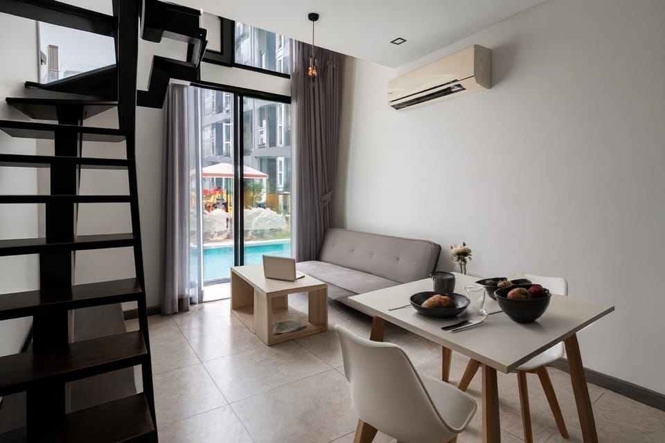 Living room, Seating area, Dining area, Pool view, Swimming pool, air conditioner
