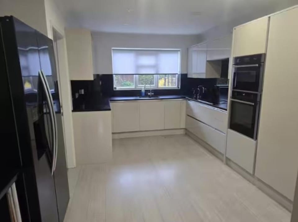 Kitchen or kitchenette, microwave, oven, stove