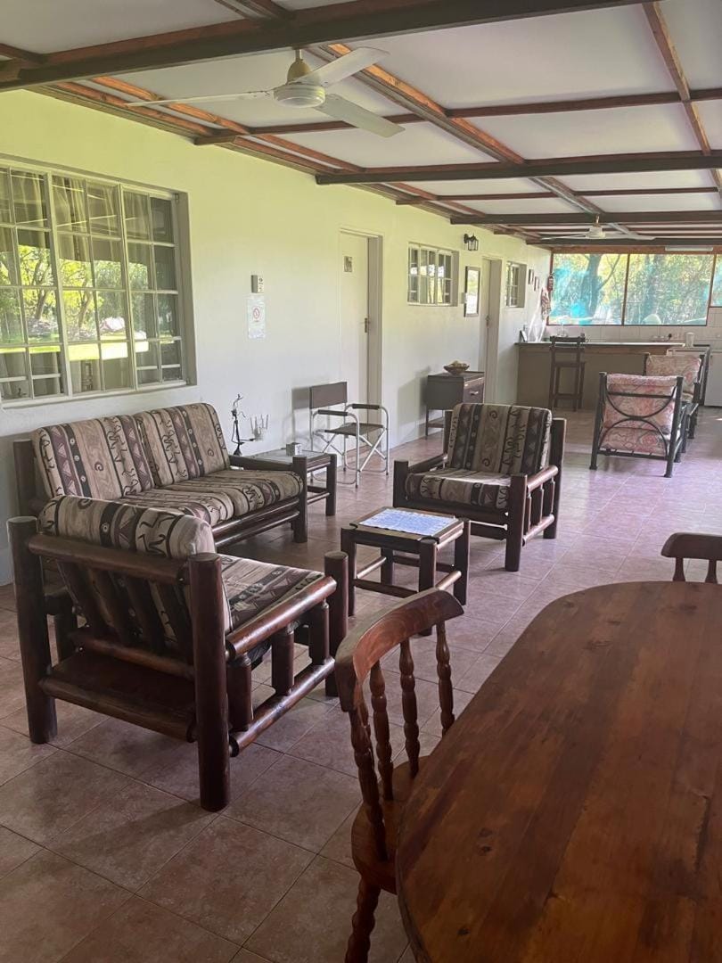 Property building, Living room, Seating area, Dining area