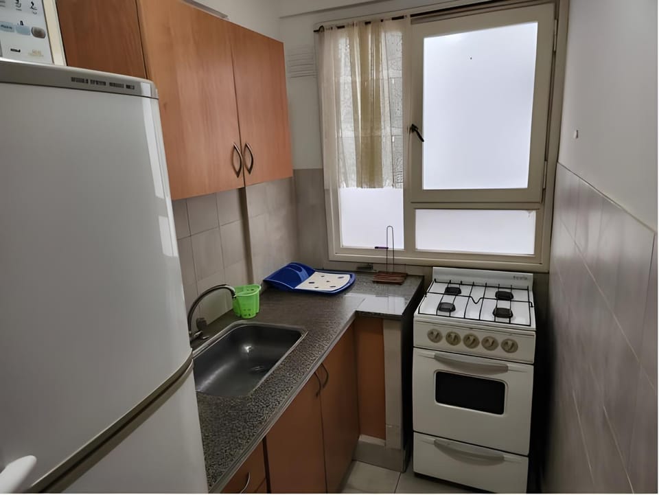 Kitchen or kitchenette, oven