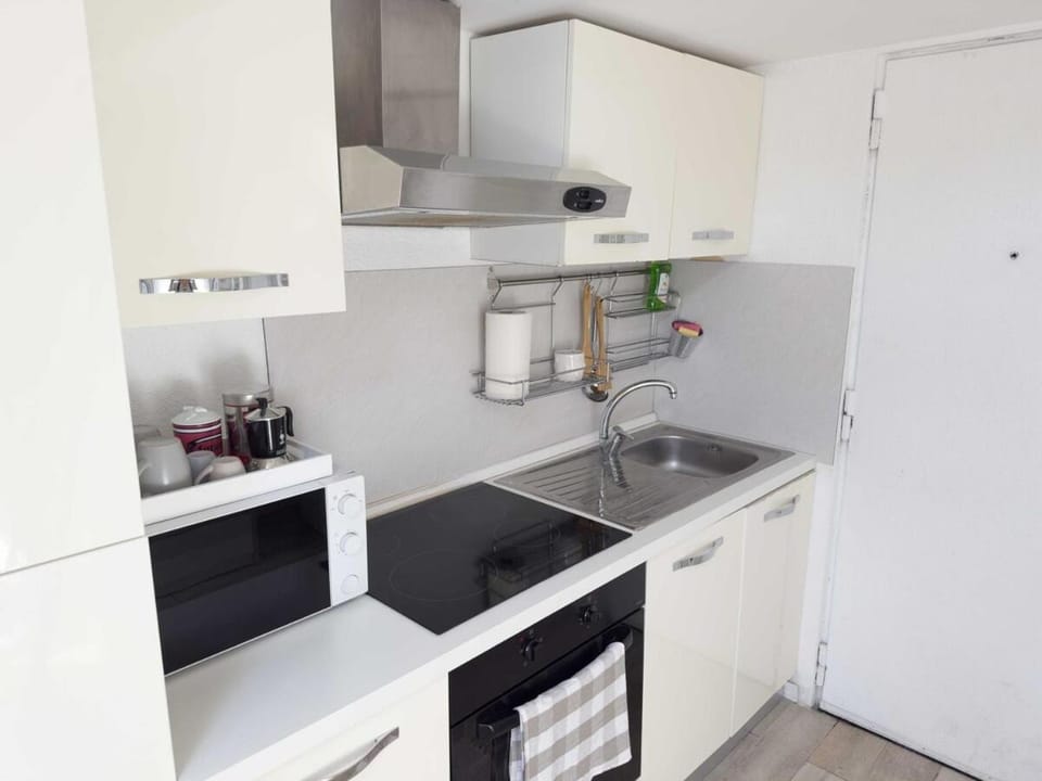 Kitchen or kitchenette, stove