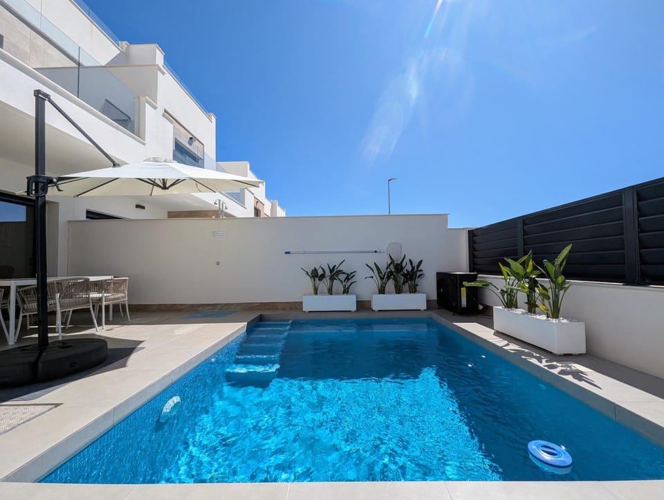 Property building, Living room, Swimming pool