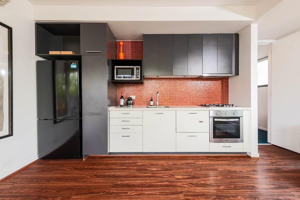 Kitchen or kitchenette, oven, stove