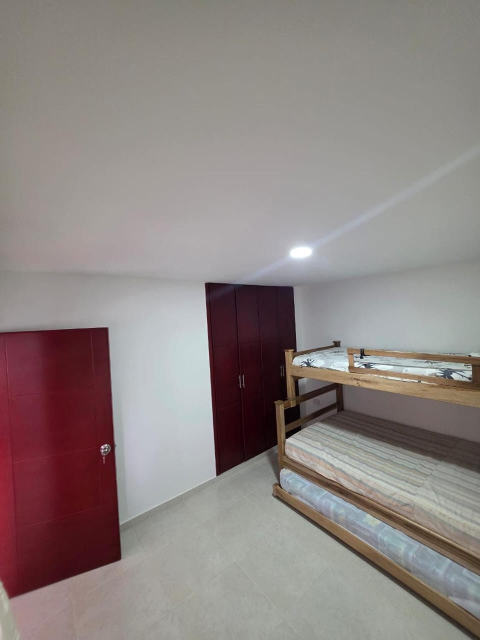 Photo of the whole room, bunk bed, wardrobe