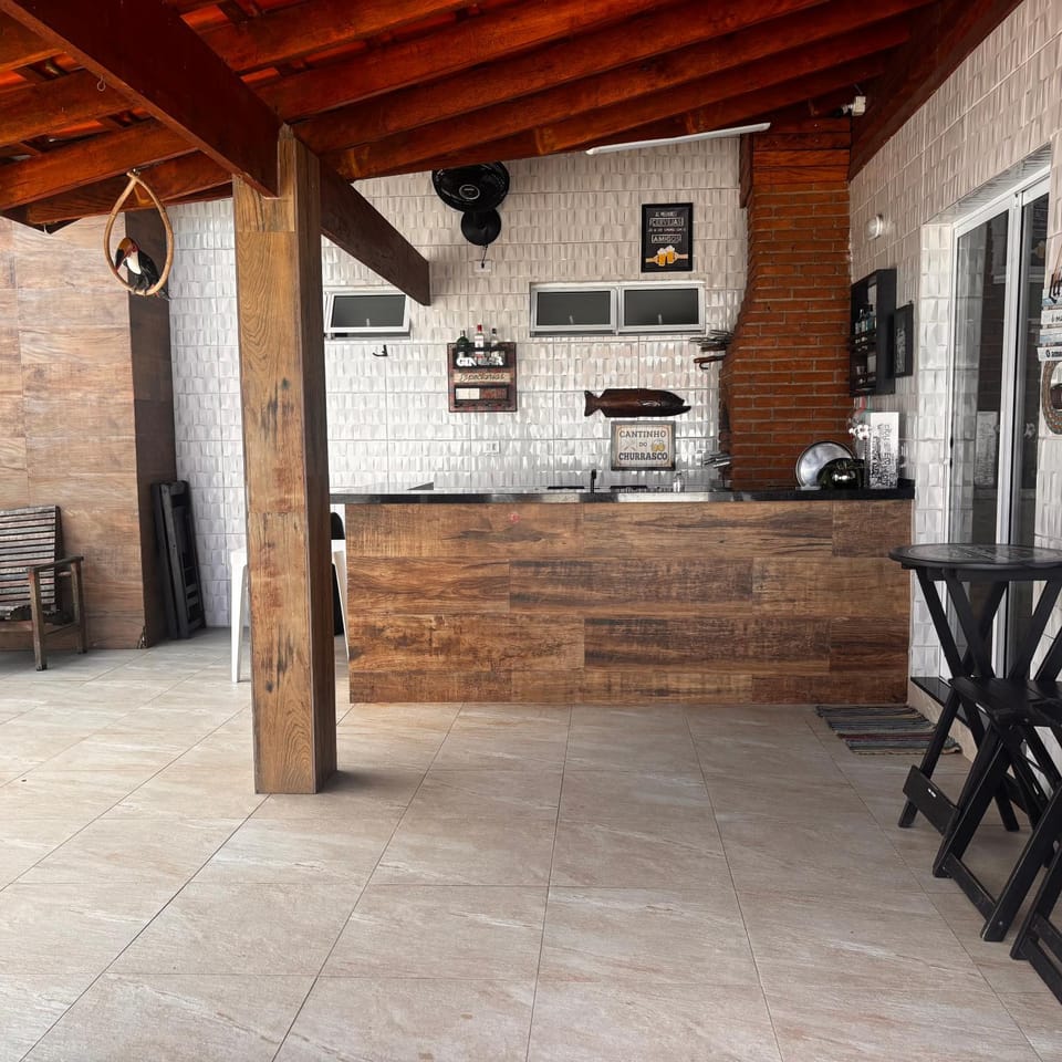Casa em Bertioga com piscina House in Bertioga