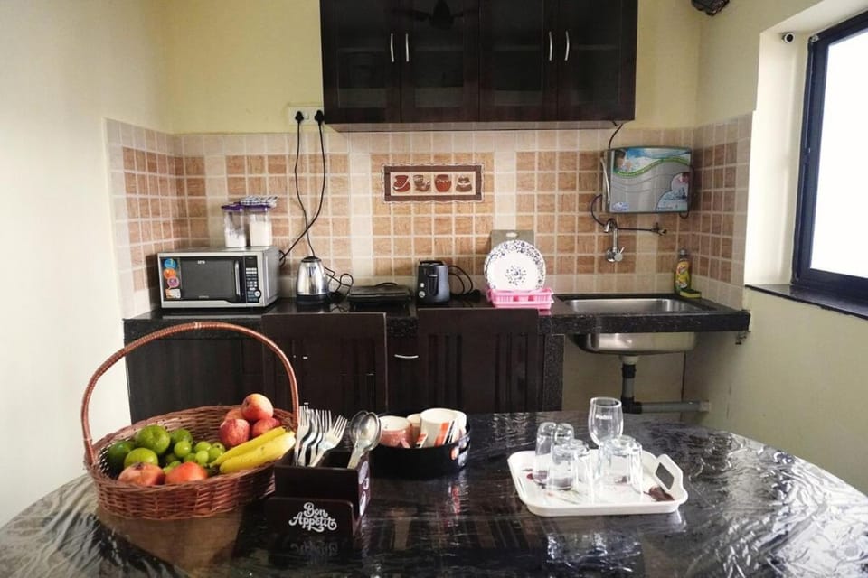 Kitchen or kitchenette, oven, stove, toaster