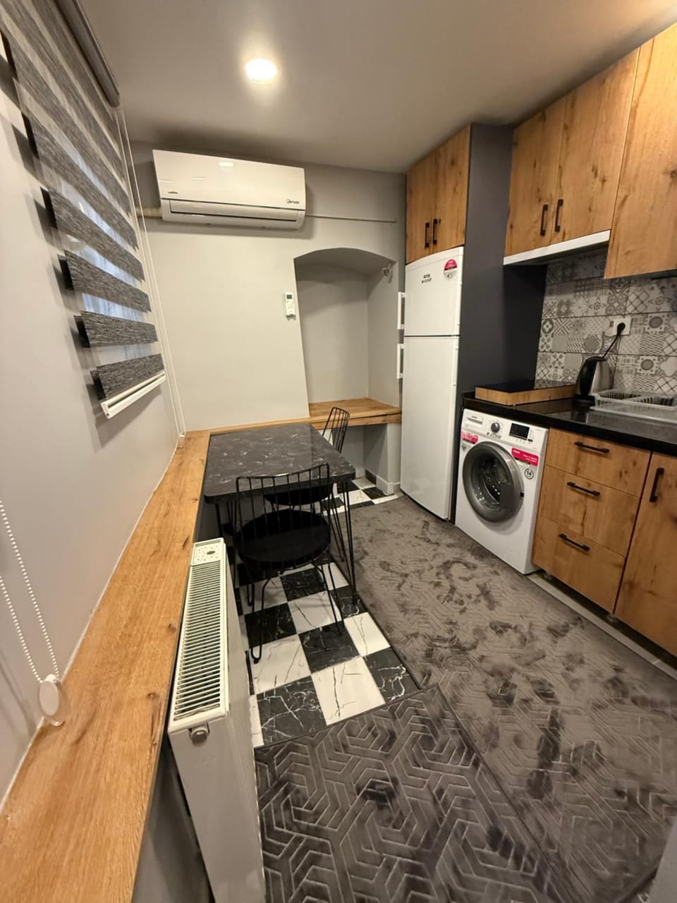 Kitchen or kitchenette, Dining area, stove, washing machine, air conditioner