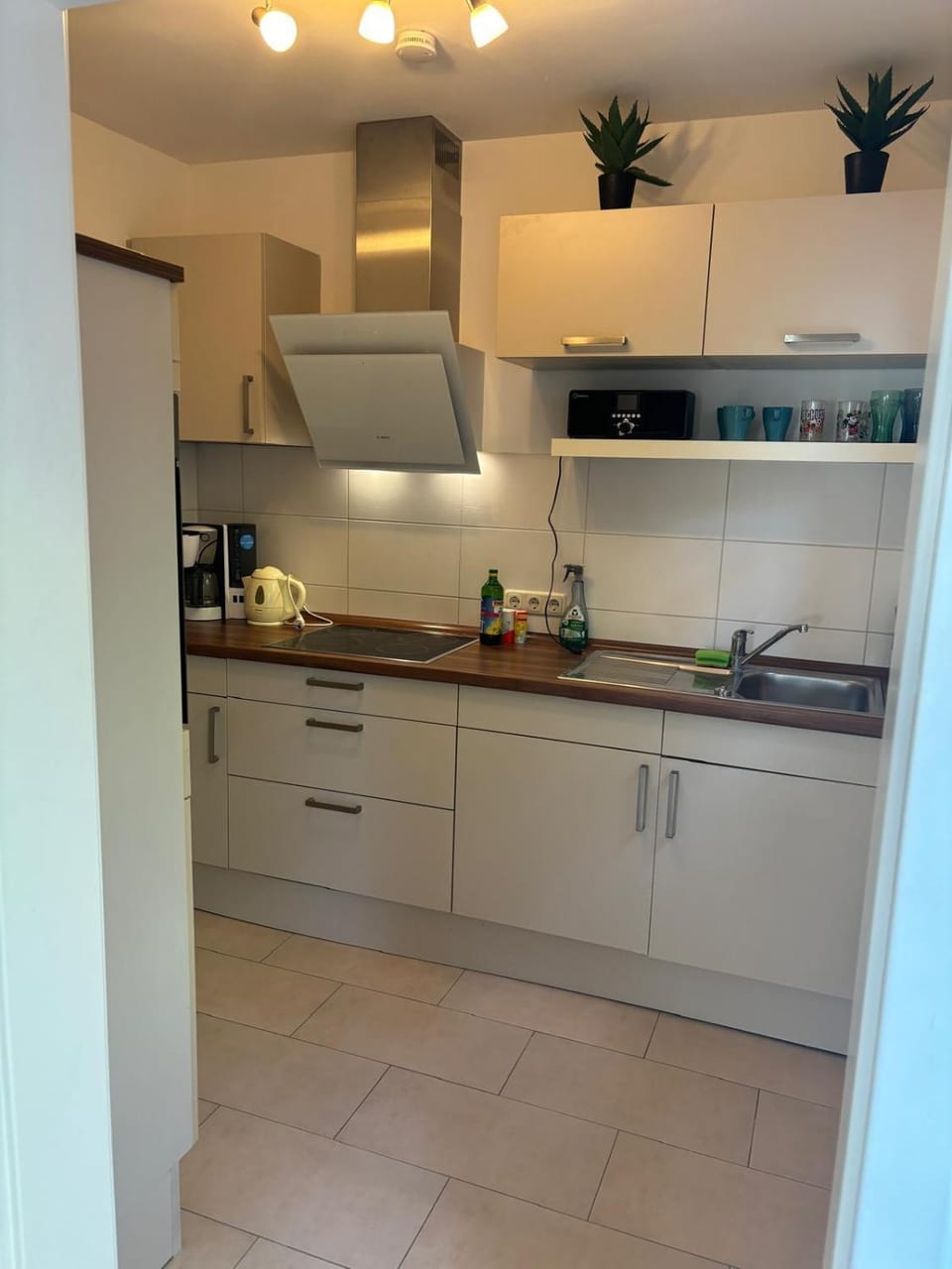 Kitchen or kitchenette, stove