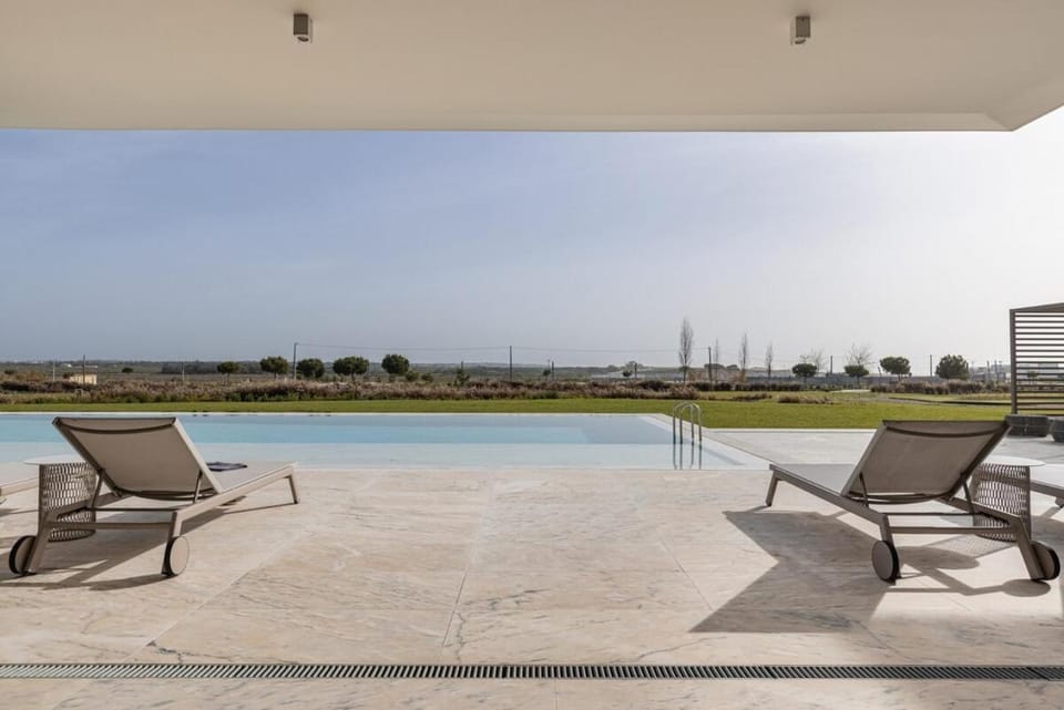 Patio, Day, Natural landscape, View (from property/room), Pool view, Swimming pool, sunbed