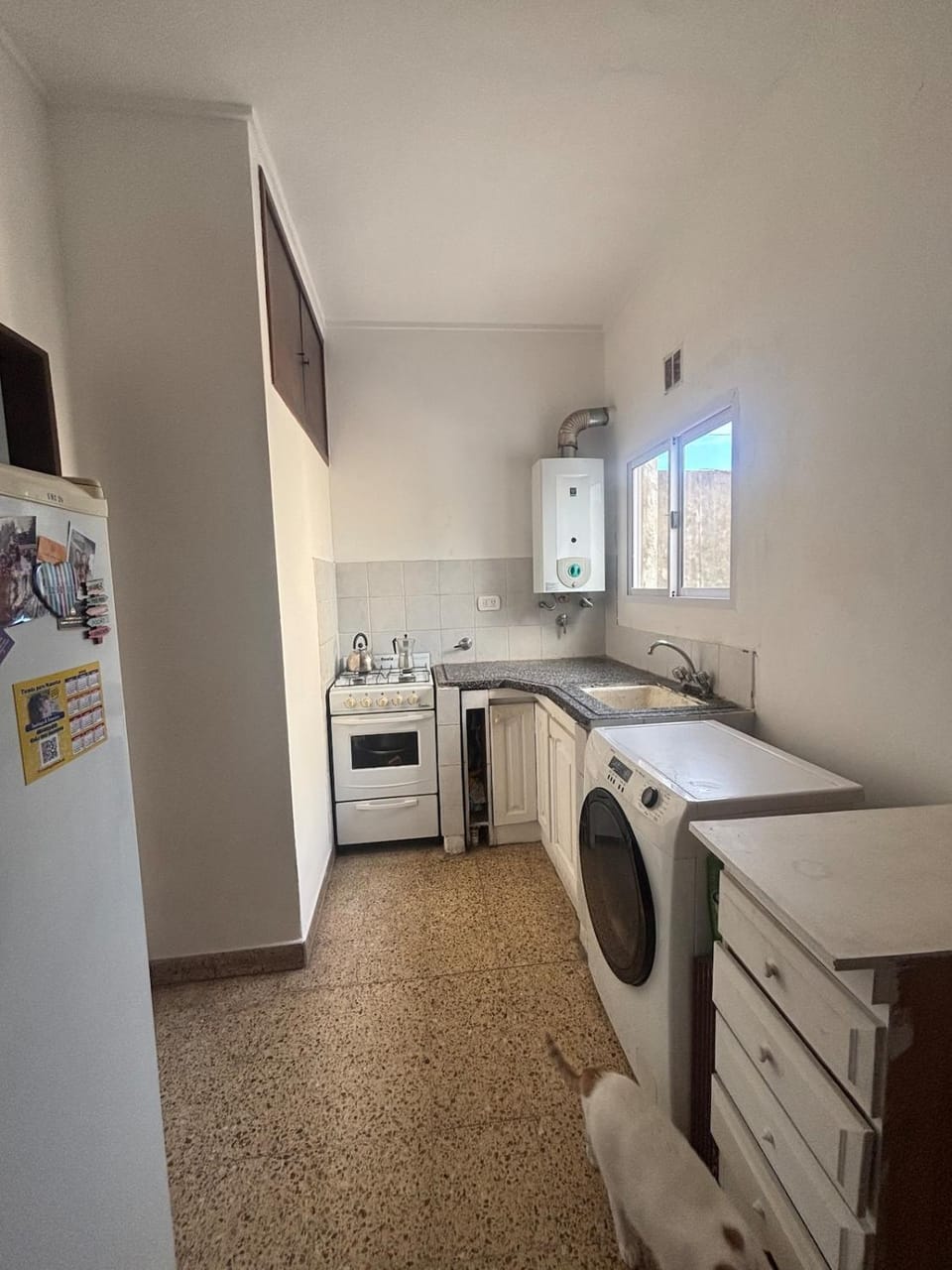 Kitchen or kitchenette, oven, stove, washing machine