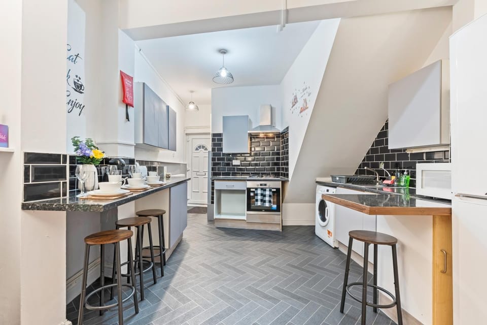 Kitchen or kitchenette, Text overlay, Parking, furniture, kitchen