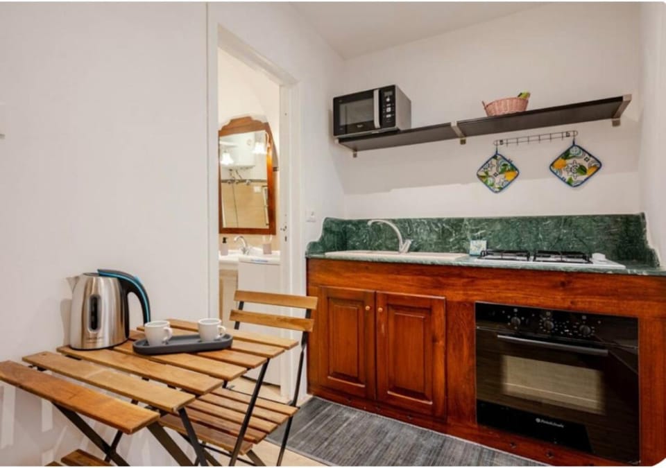 Kitchen or kitchenette, microwave, oven, kitchen, kitchen