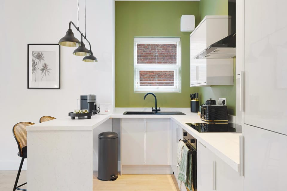 Kitchen or kitchenette, stove, toaster