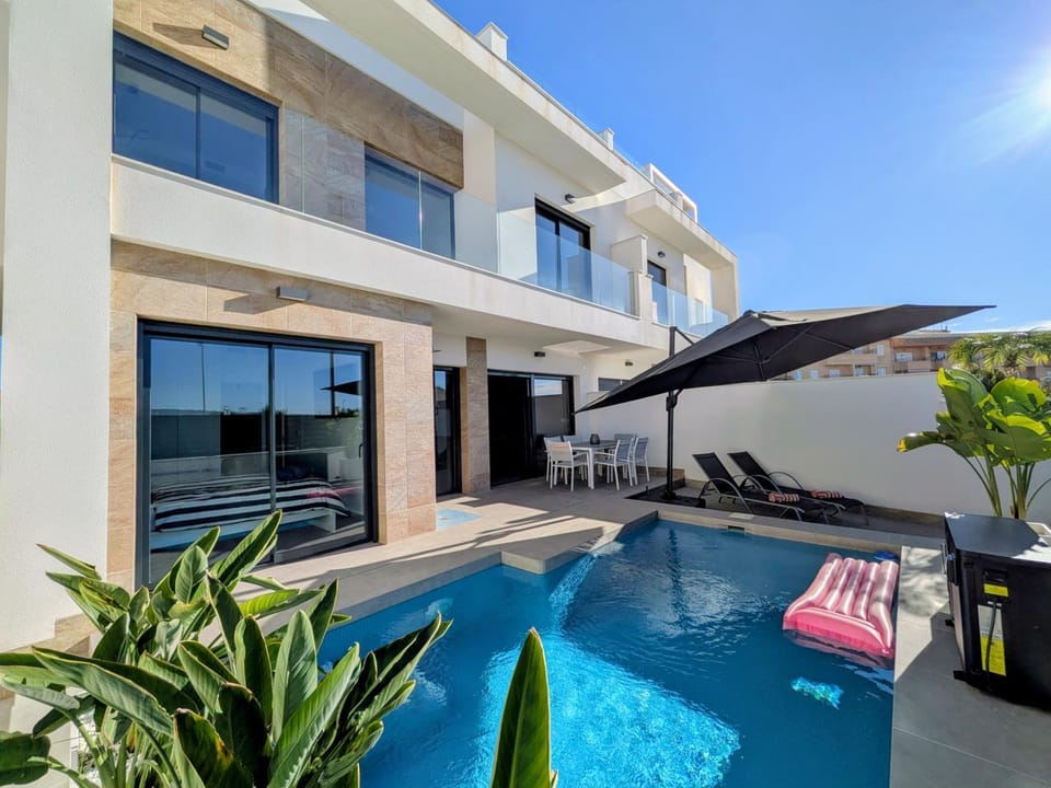 Property building, Living room, Swimming pool