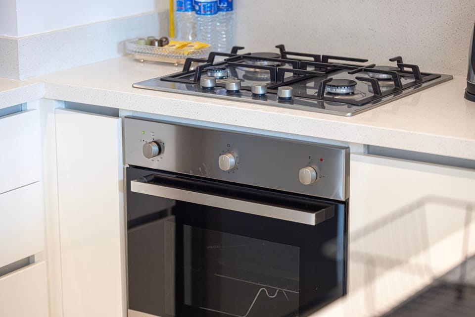 Kitchen or kitchenette, stove