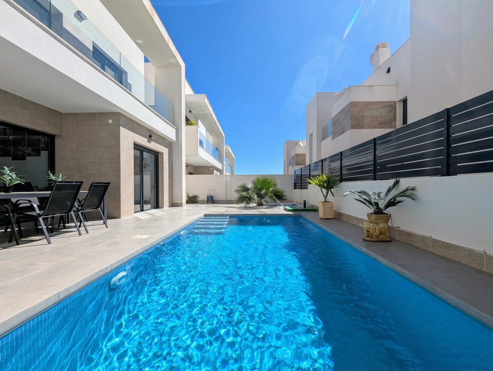 Property building, Living room, Swimming pool