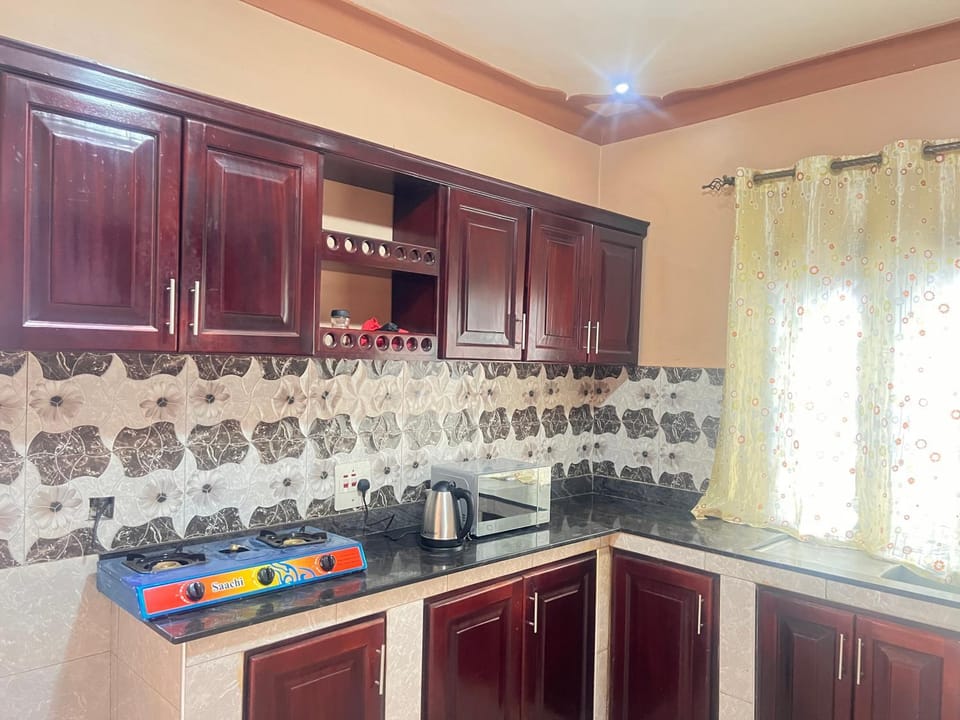Kitchen or kitchenette, stove