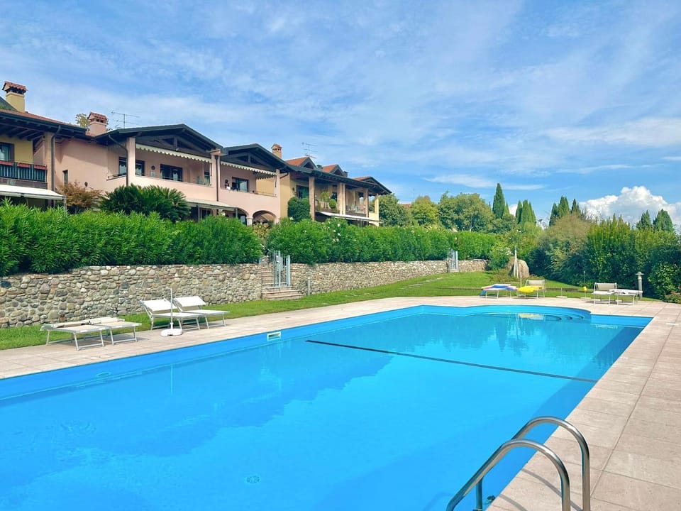 Property building, Pool view, Swimming pool, sunbed