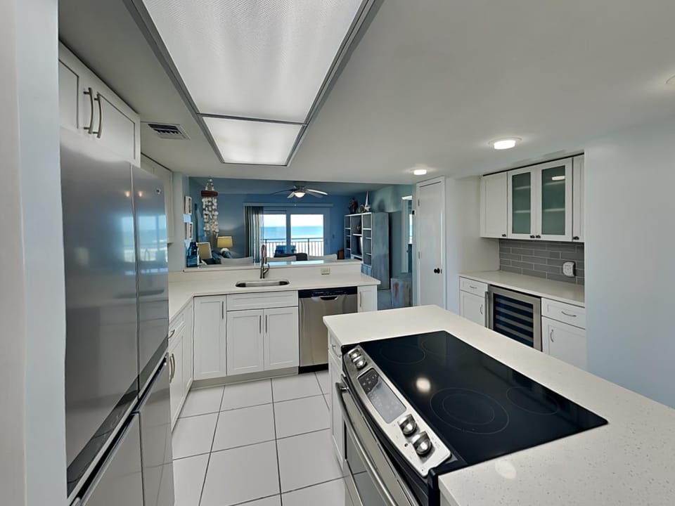 Kitchen or kitchenette, Living room, Sea view, Swimming pool, dishwasher, furniture, microwave, oven, stove