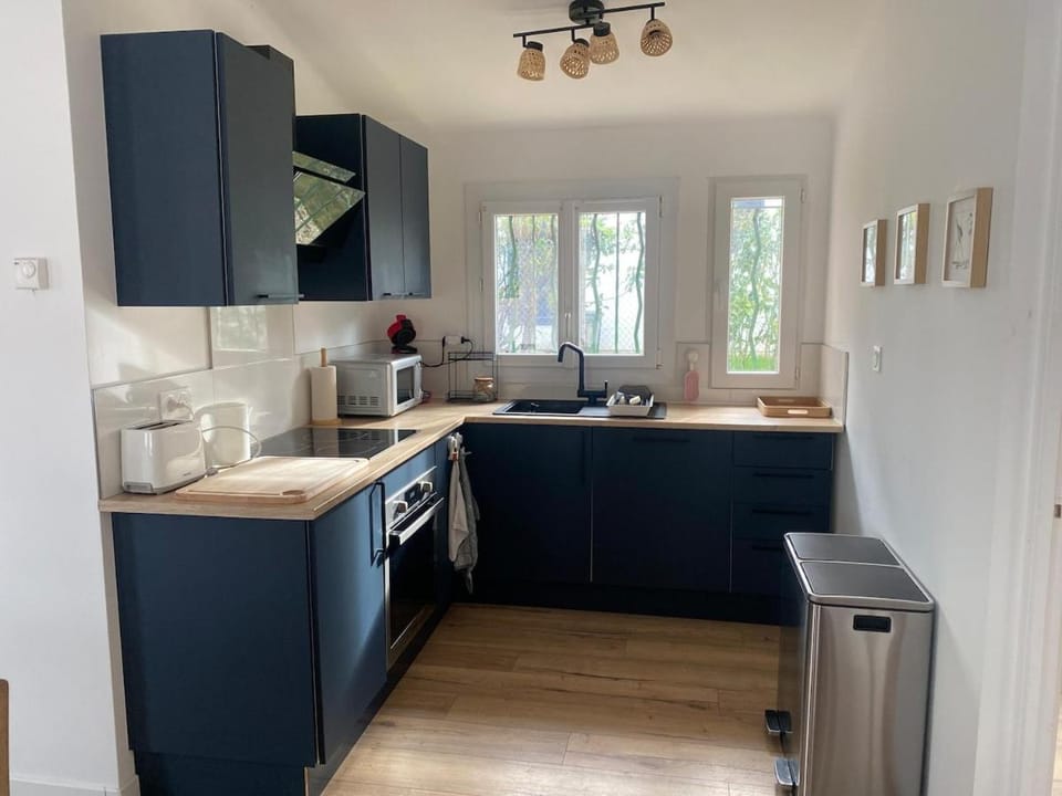 Kitchen or kitchenette, dishwasher, oven, stove, toaster
