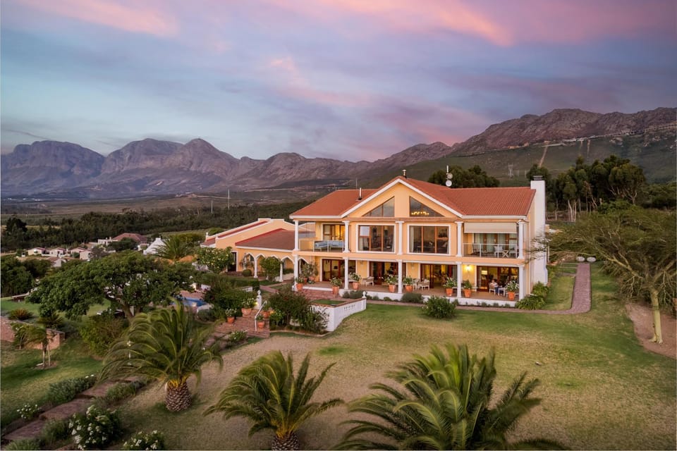 Property building, Natural landscape, Mountain view, Sunset