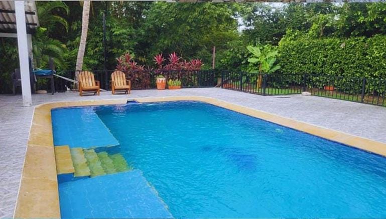 Swimming pool, sunbed