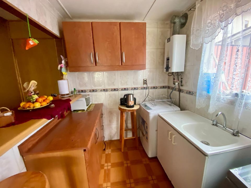 Kitchen or kitchenette, oven, stove