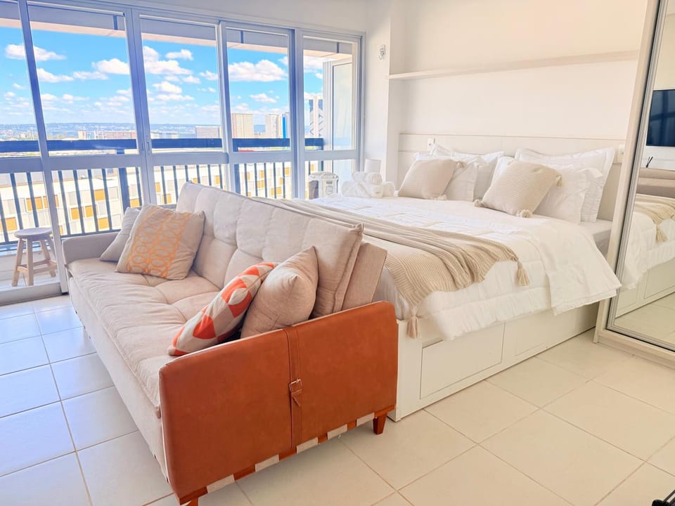 Bed, Living room, Seating area, Bedroom