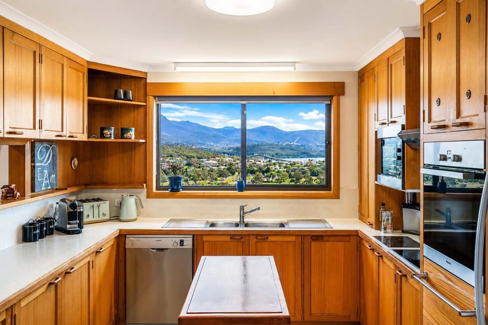 The Lookout with City water and Mountain views House in Bellerive