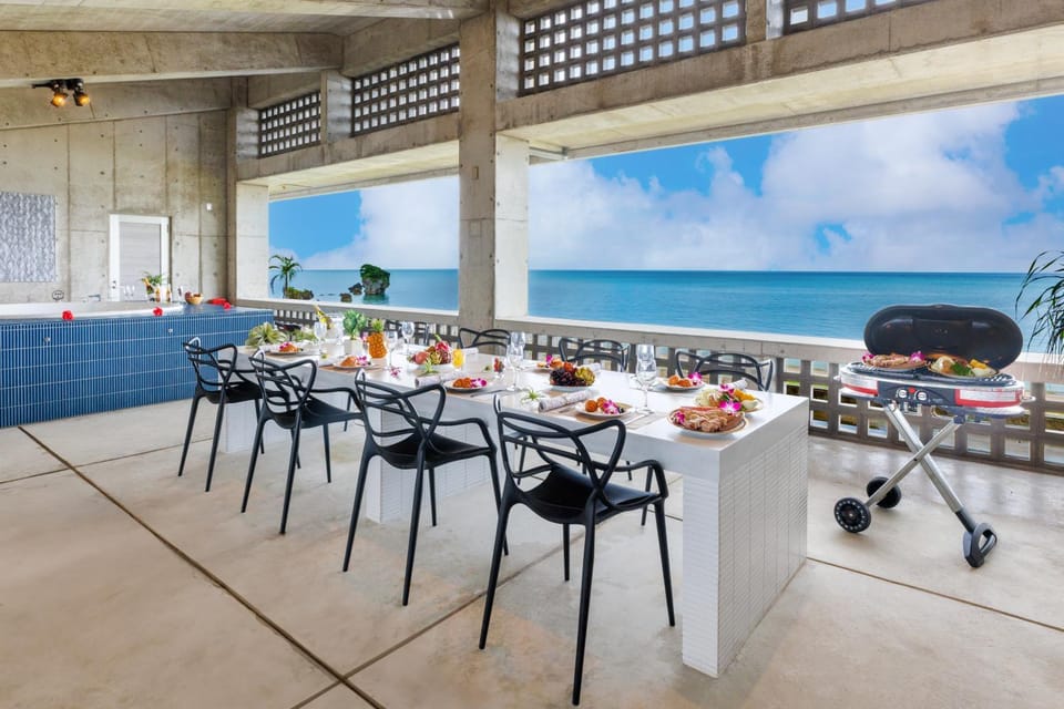 10 seconds to the sea, jacuzzi & BBQ available, ocean view from every room on the beach Terrace House in Okinawa Prefecture