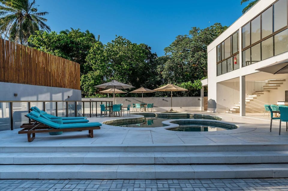 Property building, Spring, Day, Living room, Seating area, Pool view, Swimming pool, sunbed