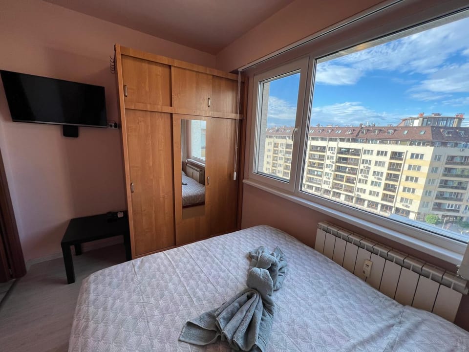 Bed, TV and multimedia, Bedroom, towels, wardrobe