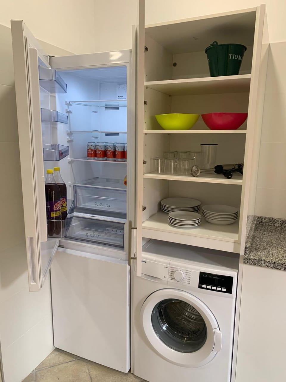 Kitchen or kitchenette, washing machine