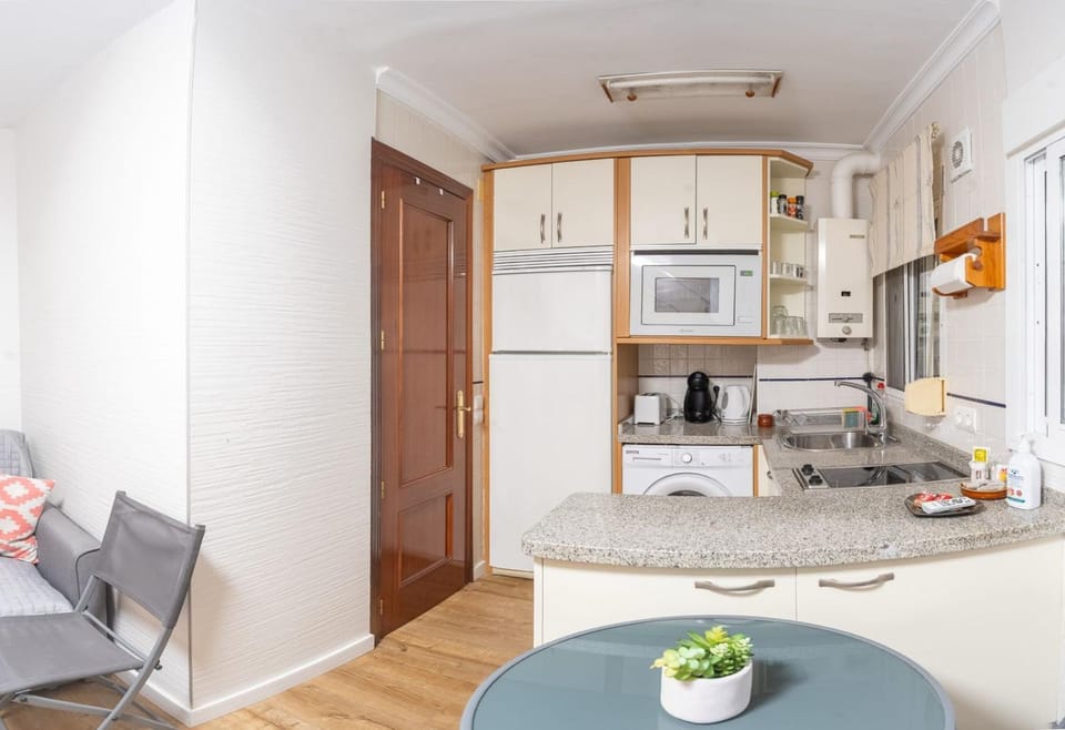 Kitchen or kitchenette, stove, kitchen