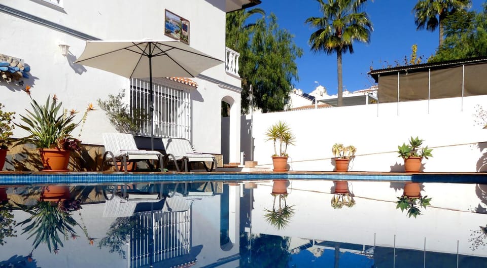 Property building, Living room, Swimming pool