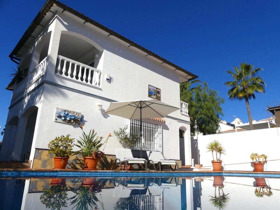 Property building, Living room, Swimming pool