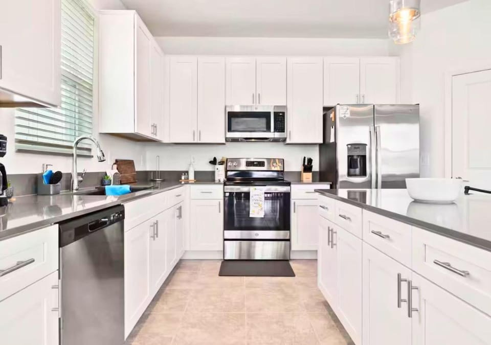 Kitchen or kitchenette, dishwasher, oven, stove, toaster, kitchen
