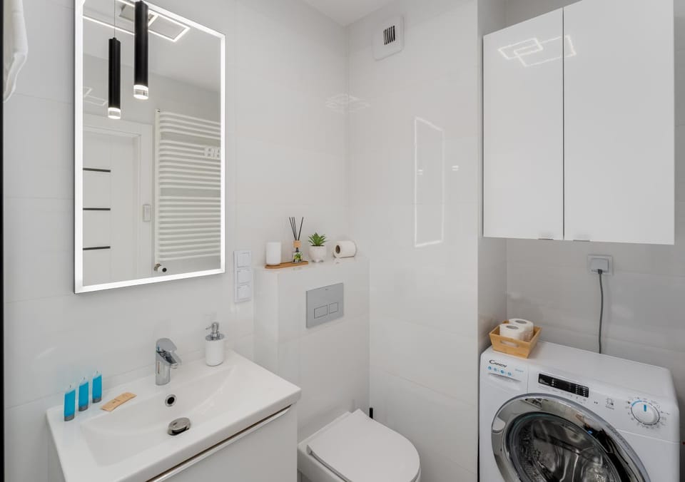 Bathroom, towels, washing machine, dryer