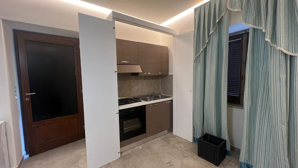 Kitchen or kitchenette, stove