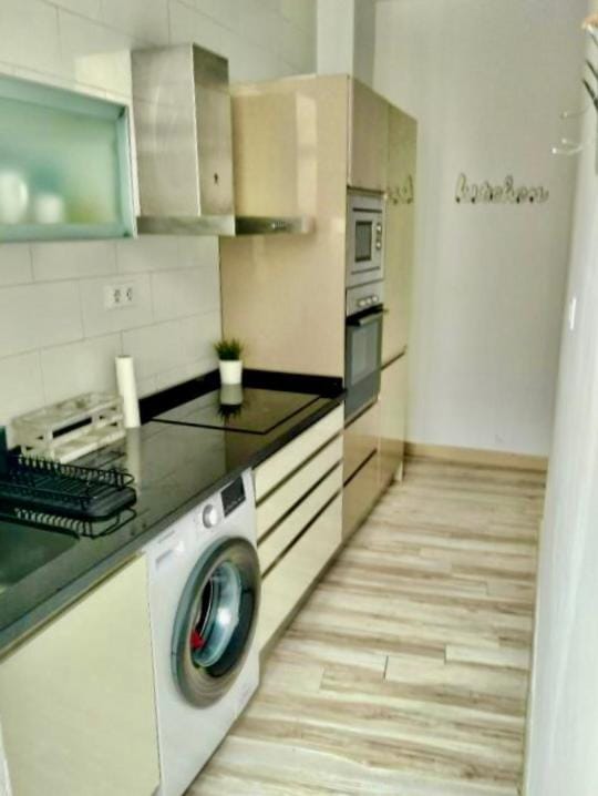 Kitchen or kitchenette, oven, stove