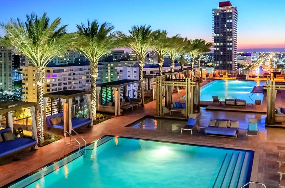 Property building, Patio, Night, Natural landscape, Evening entertainment, City view, Pool view, Swimming pool, sunbed