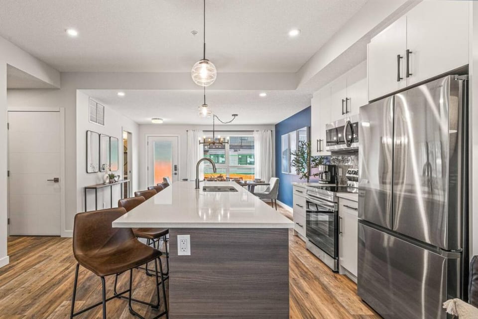 Kitchen or kitchenette, dishwasher, oven, stove
