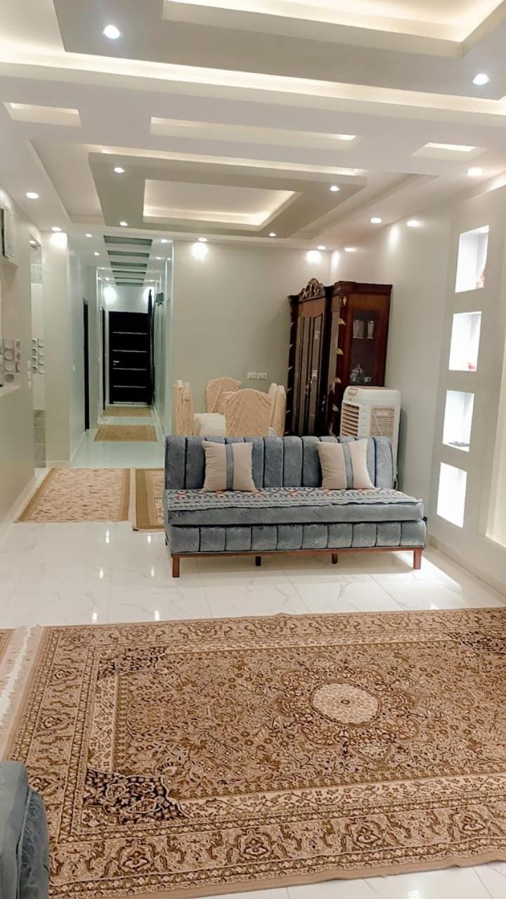 شقه كامله بفيلا فاخره الشيخ زايد بجوار مول مزار ومول اركان وممشى اهل زايد 3غرف وشرفه Apartment in Egypt