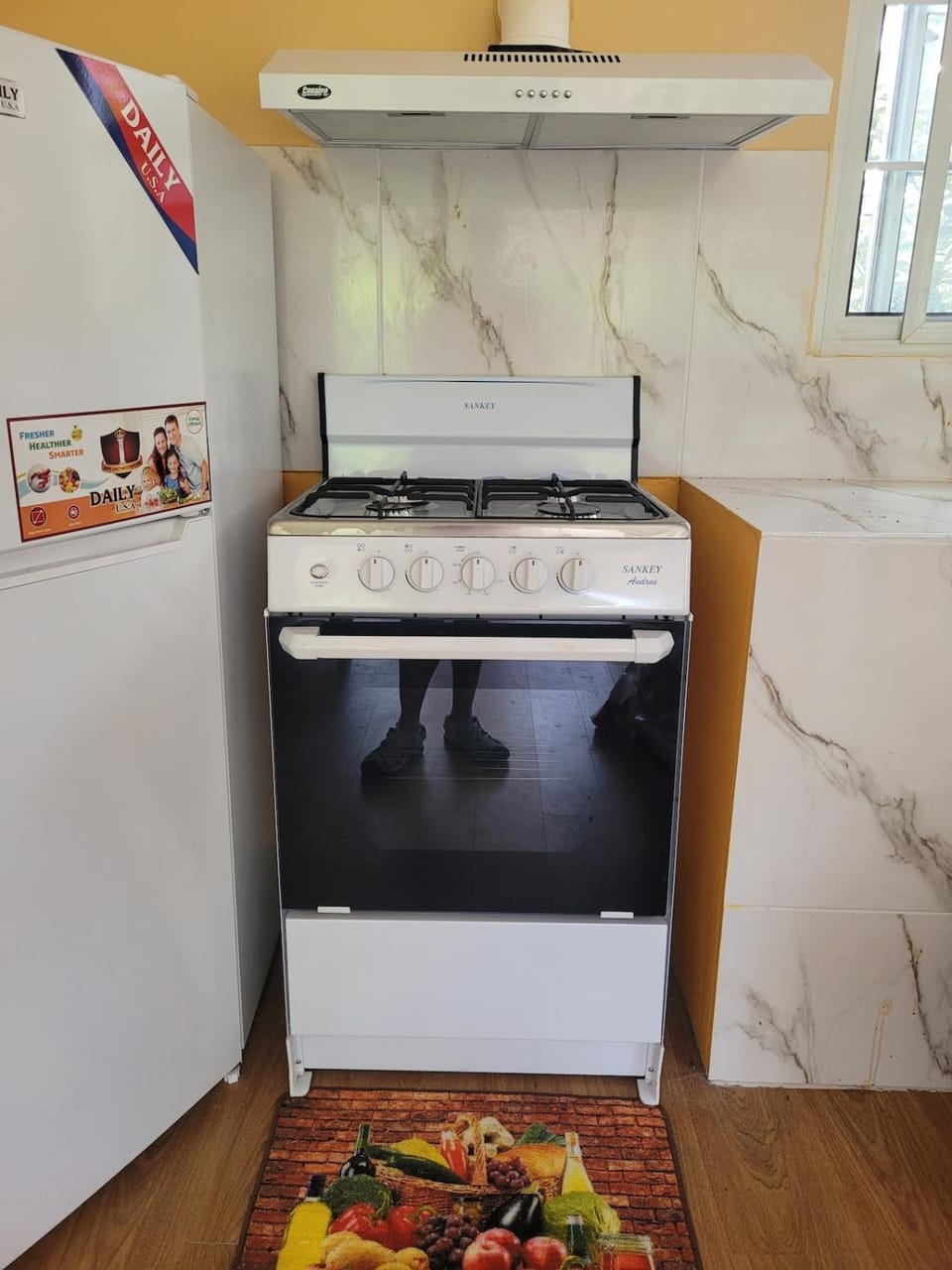 Kitchen or kitchenette, oven