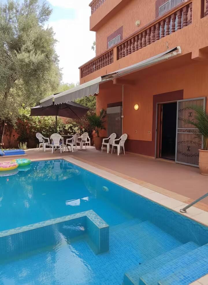 Property building, Pool view, Swimming pool, sunbed