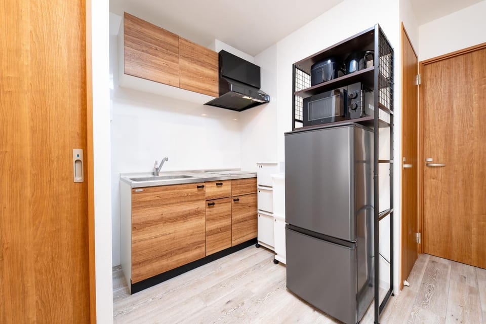 Kitchen or kitchenette, microwave, stove