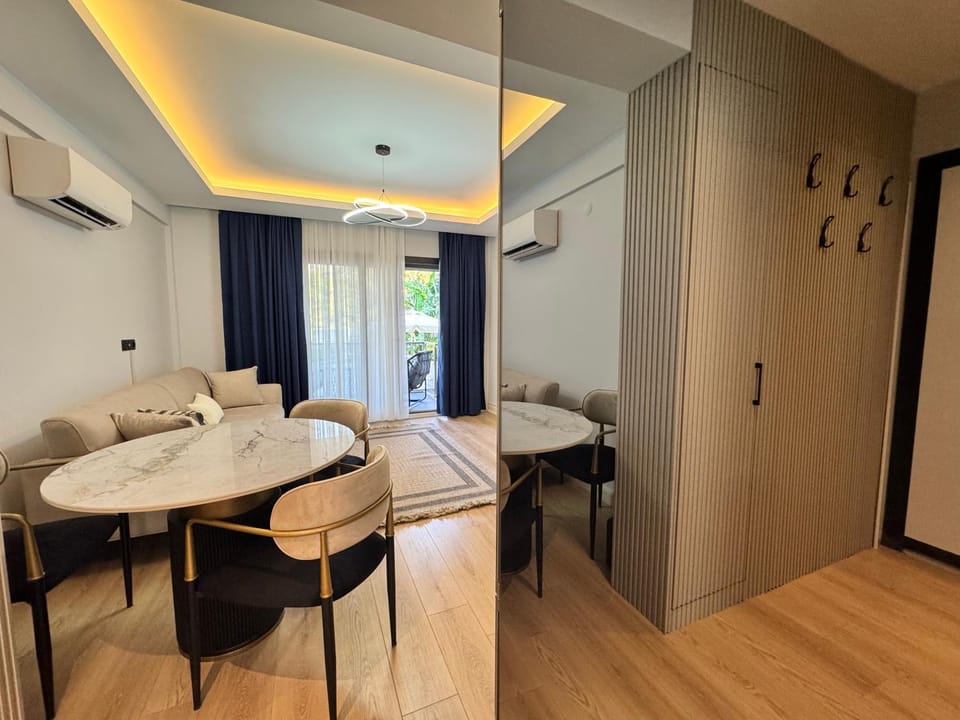 Living room, Seating area, Dining area, wardrobe, air conditioner