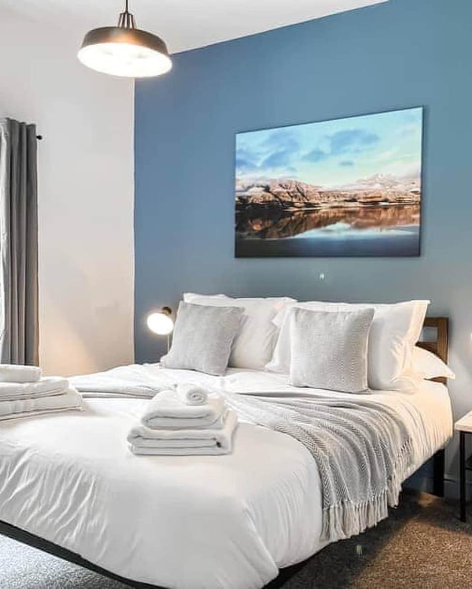 Bed, Bedroom, flat iron, hair dryier, towels